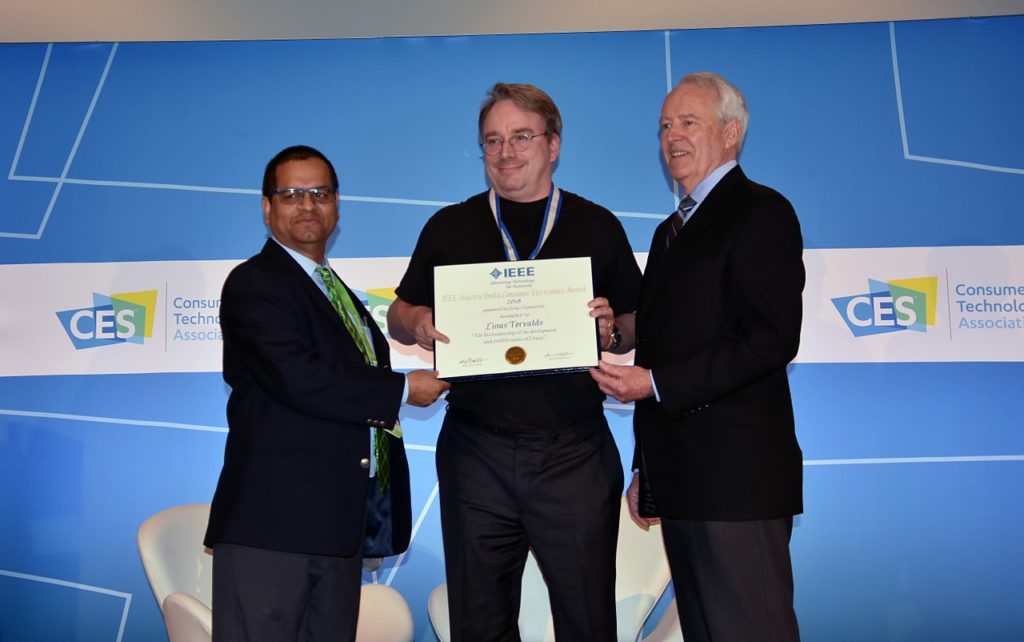  Linus Torvalds receiving 2018 IEEE Masaru Ibuka Consumer Electronics Award from ICCE 2018 Conference Chair Saraju P. Mohanty, and IEEE President James A. Jefferies at ICCE 2018 on 12 Jan 2018 at Las Vegas.